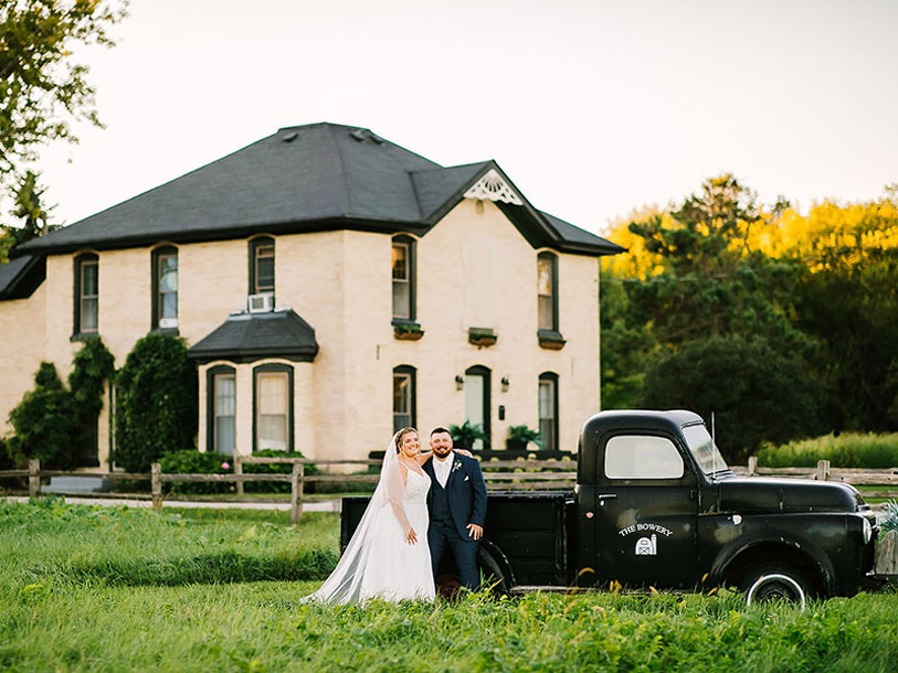 newley weds in front of the bowery a wisconsin barn wedding venue